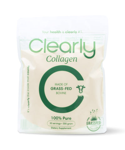 Clearly grass-fed collagen powder in a jar, showing the textured powder and label on the front of the container.